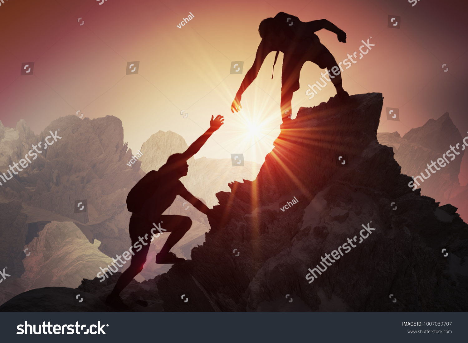 Help and assistance concept. Silhouettes of two people climbing on mountain and helping. #1007039707