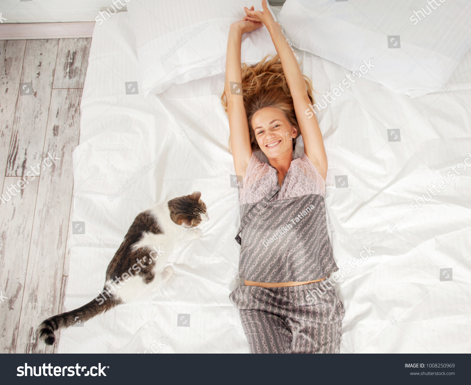 Woman in the morning in bed. Female at home #1008250969