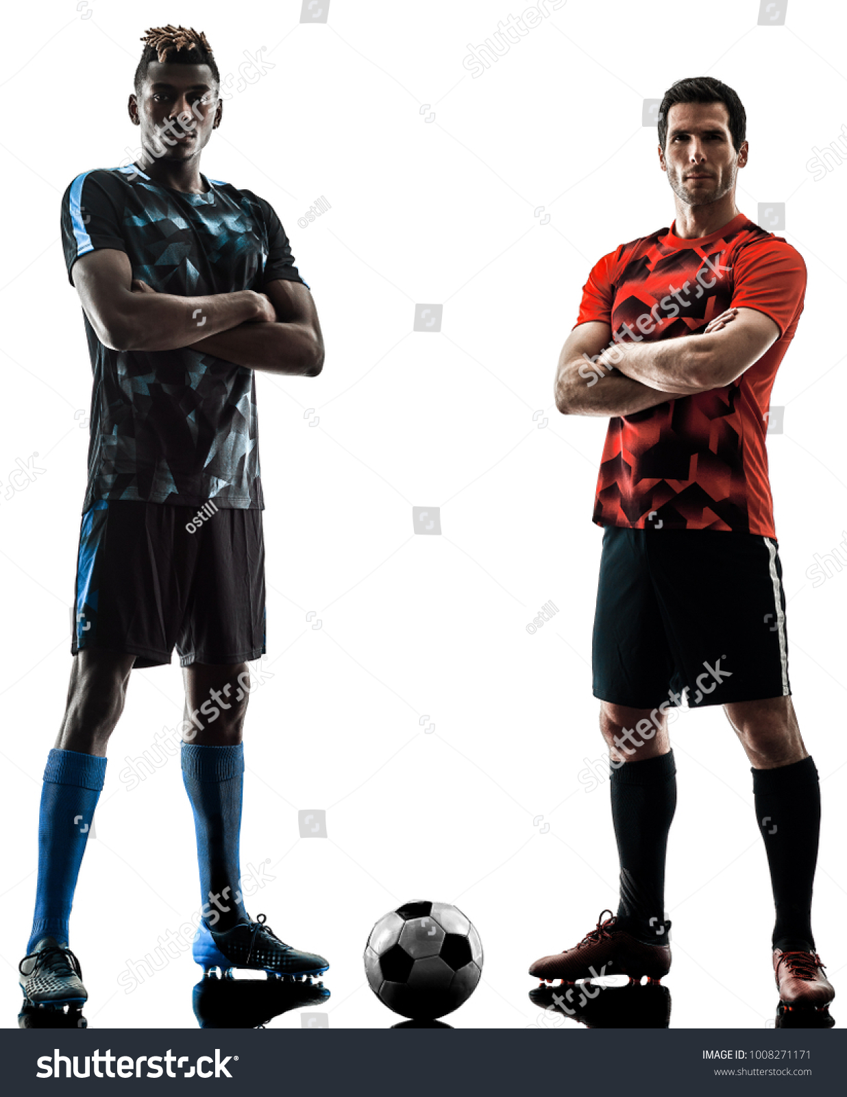 two soccer players men in studio silhouette isolated on white background #1008271171