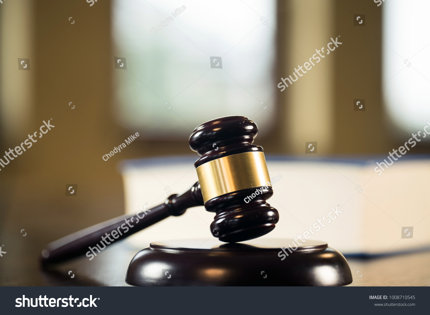Law and Justice concept. Mallet of the judge, books, scales of justice. Courtroom theme. #1008710545