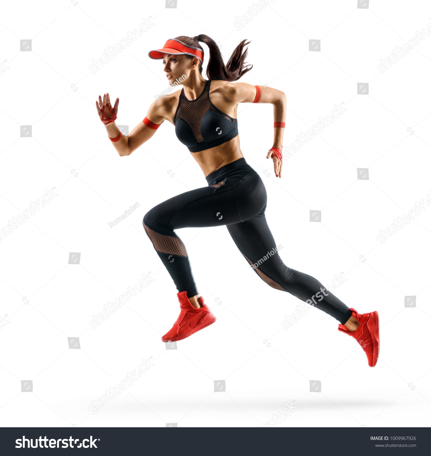 Woman runner in silhouette on white background. Dynamic movement. Side view #1009967926
