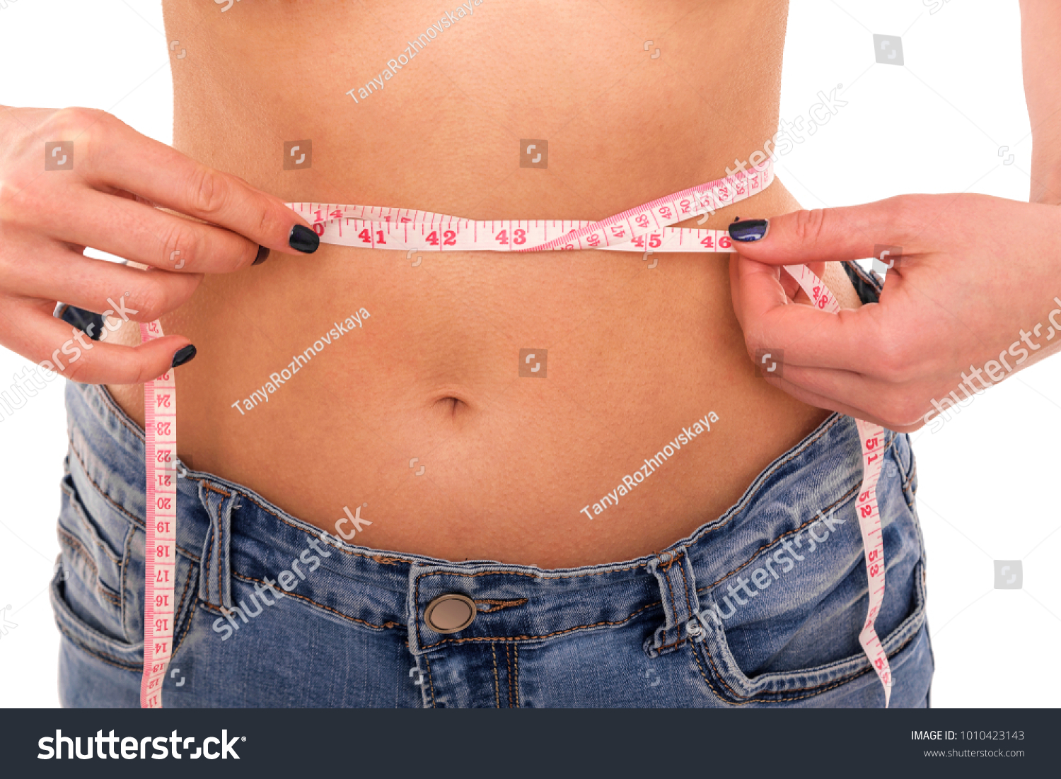 Centimeter at the waist. Measure the waist. Female silhouette on white background. #1010423143