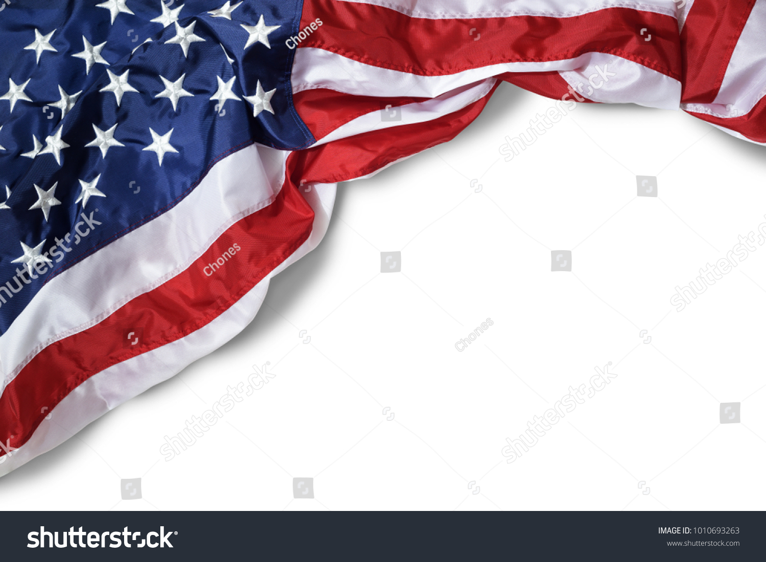 Closeup ruffled American flag isolated on white background #1010693263