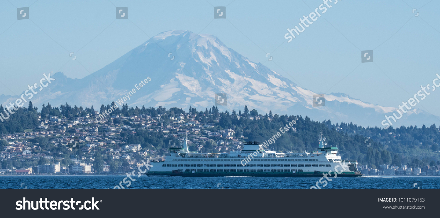 Washington State Ferry, Wenatchee, in front of West Seattle and Mount Rainier. #1011079153