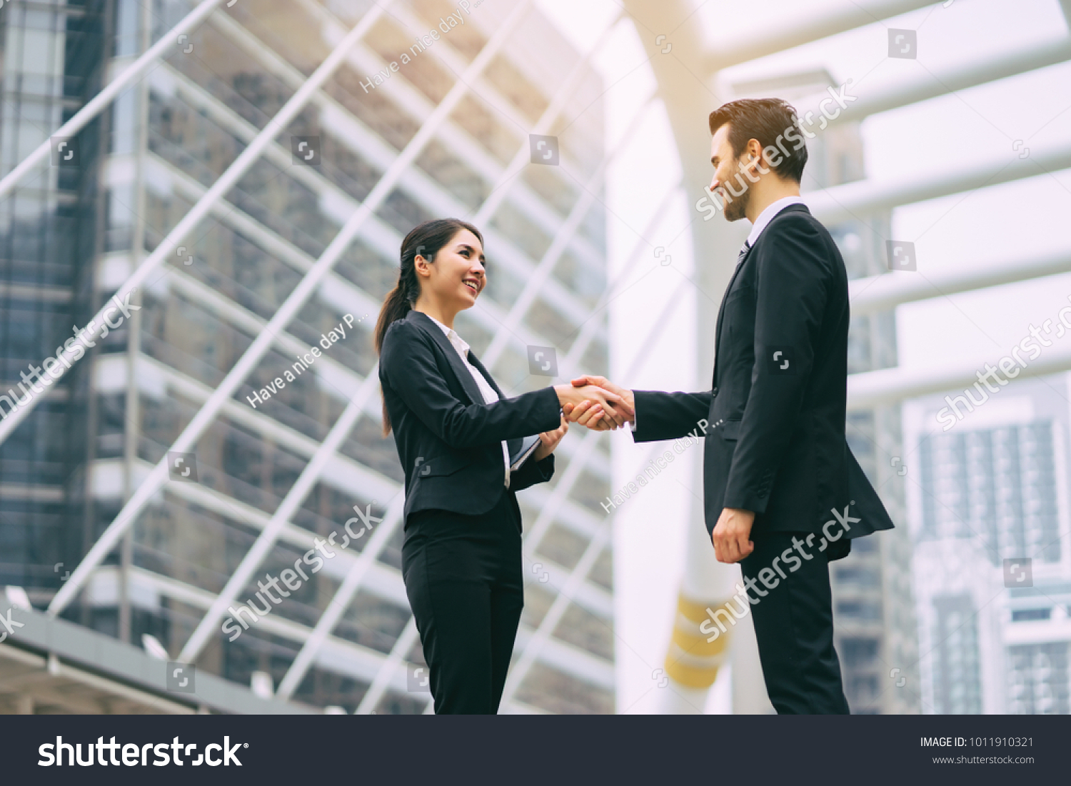 Business partnership marketing meeting concept. Image businessmans handshake. Successful businessmen handshaking after good deal.vintage color, Discussing Together Startup Idea.Working Online Project #1011910321