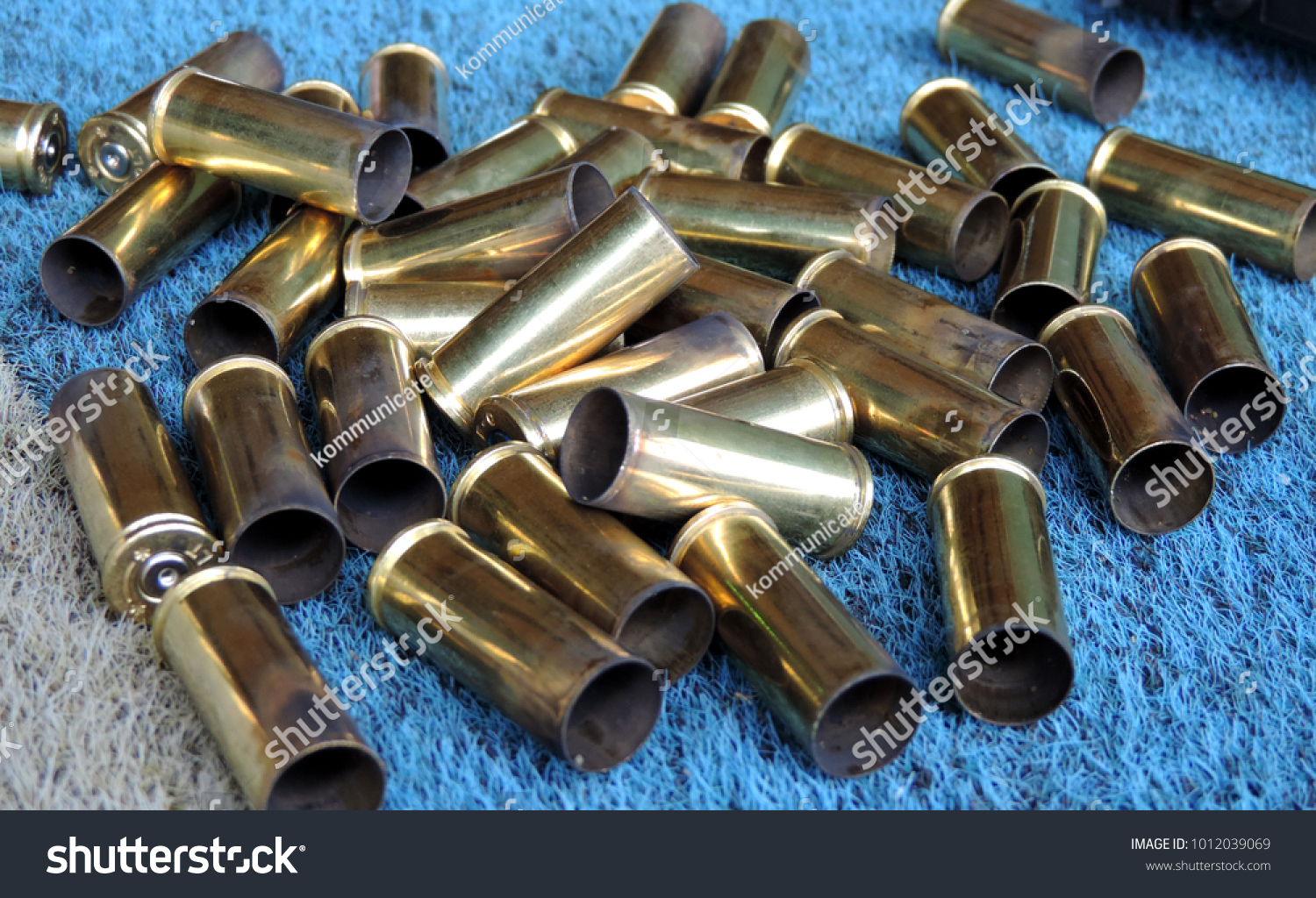 empty brass from .38 calibre ammunition used in shooting practice #1012039069