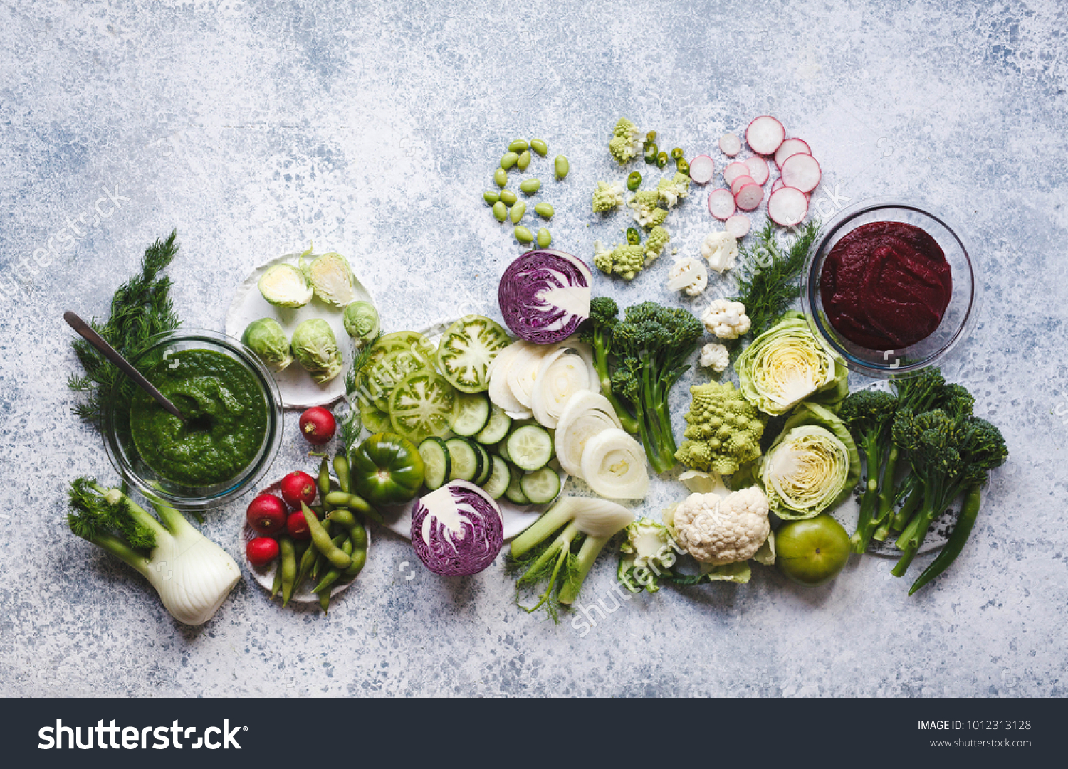 Plant based raw food vegan food cooking background. Flat-lay of fresh vegetables, greens, smoothie bowl superfoods o top view, copy space. Clean eating, alkaline diet, vegetarian concept #1012313128