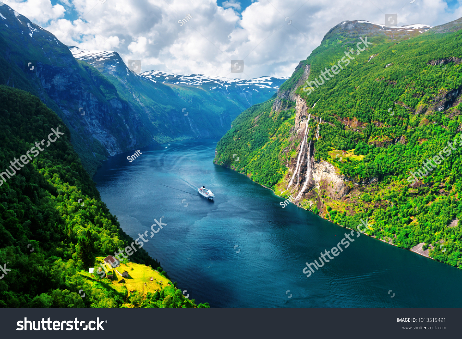 Breathtaking view of Sunnylvsfjorden fjord and famous Seven Sisters waterfalls, near Geiranger village in western Norway. #1013519491