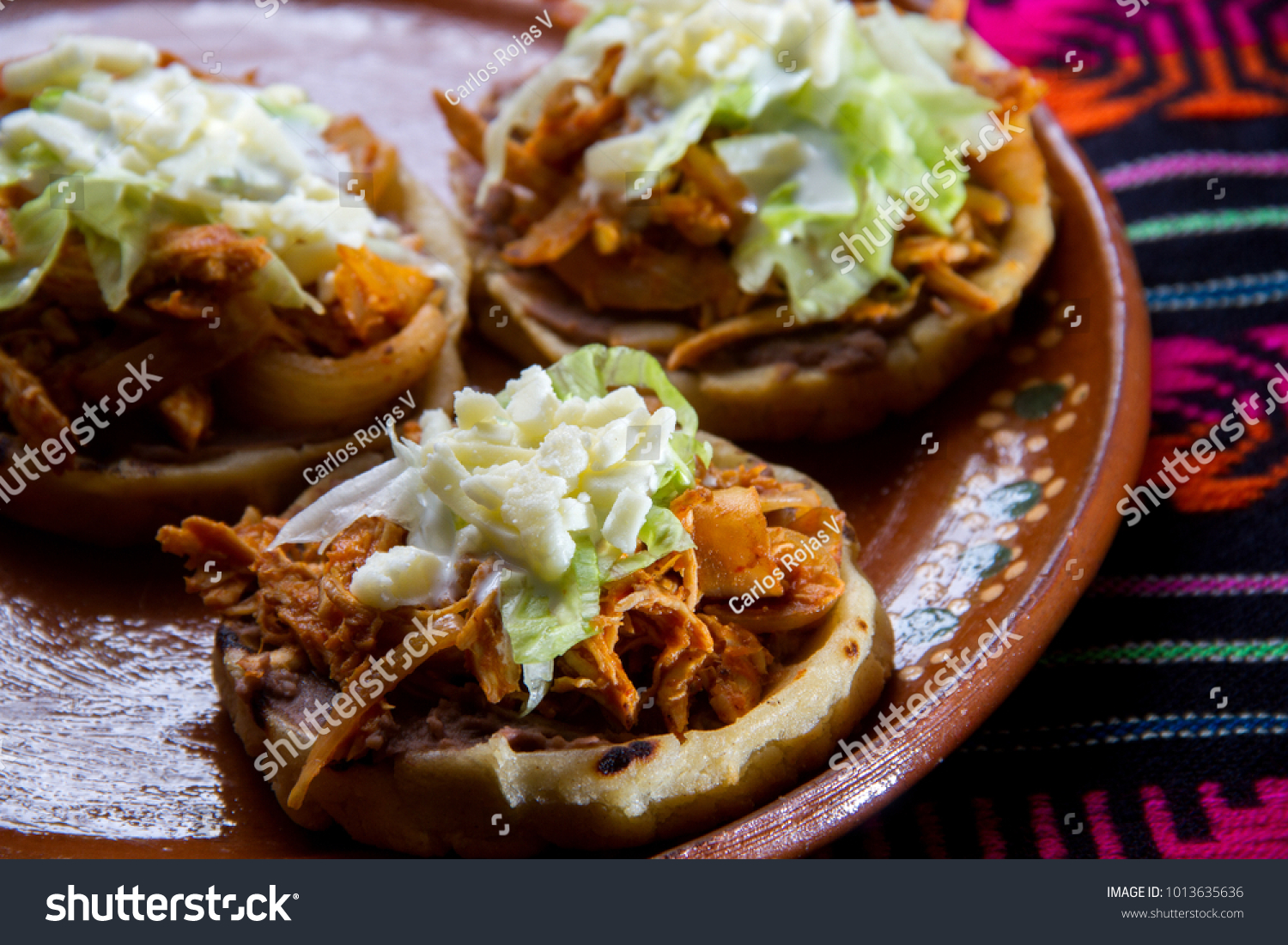Traditional mexican food: Tinga sopes #1013635636