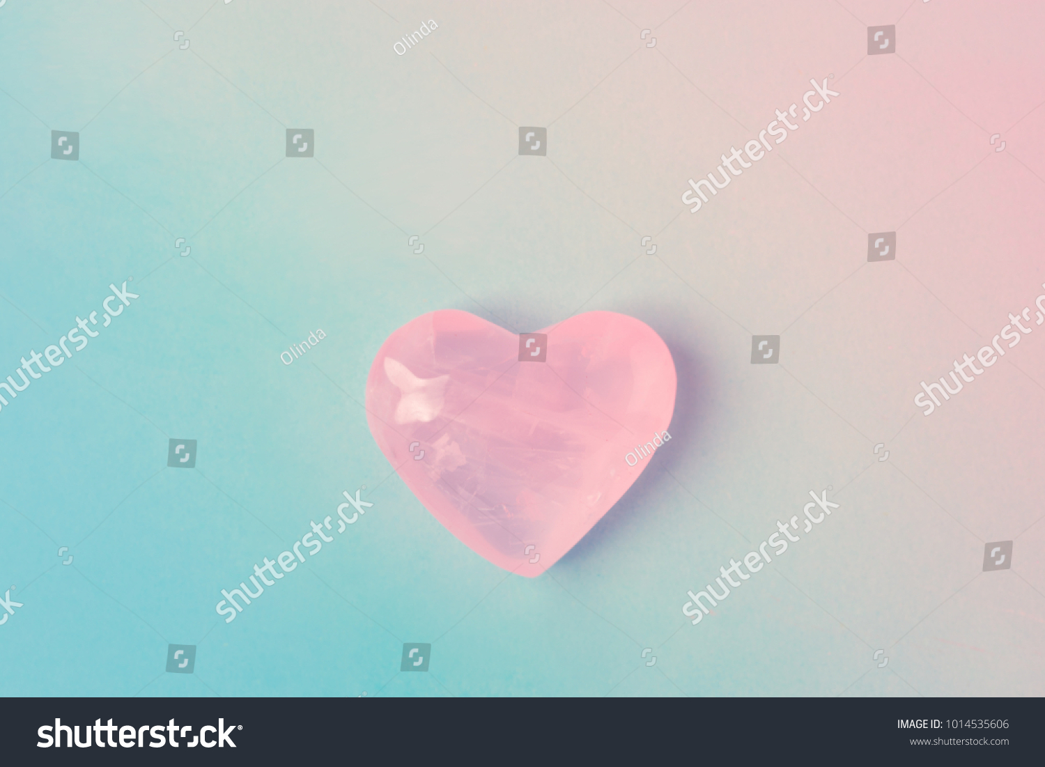 Pink Crystal Quartz Heart on Gradient Pastel Color Blue Magenta Background. Romantic Valentines Mother's Day Charity Concept. Greeting Card Poster Template. Website Banner. Copy Space #1014535606