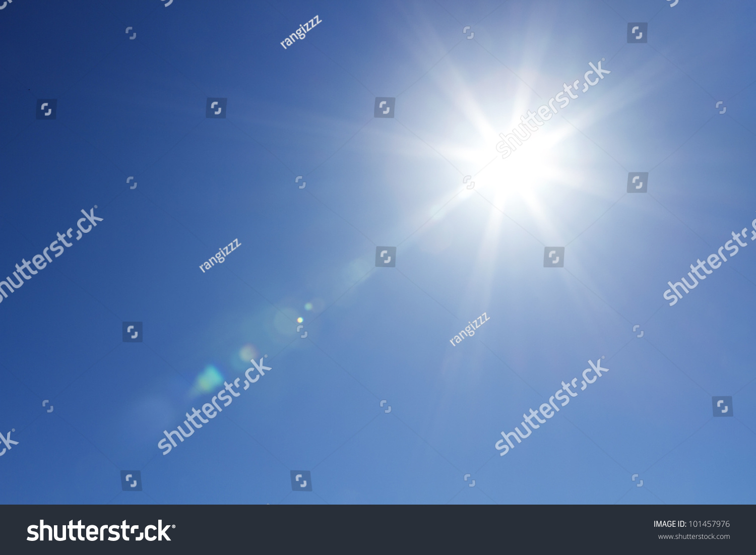 Shining sun at clear blue sky with copy space #101457976