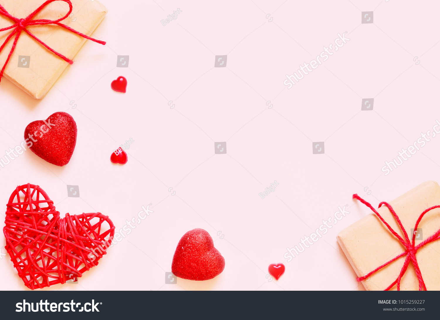 A gift on a pink background with box and hearts. The concept of the St. Valentine's day, weddings, engagements, Mother's Day, birthday, New Year, Christmas and other holidays. Flat lay. #1015259227