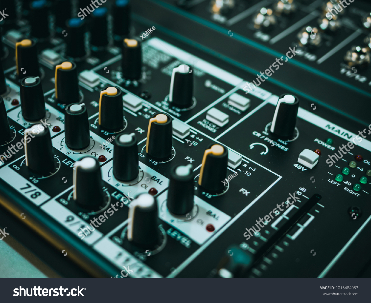 Professional audio equipment for sound recording studio faders volume regulators on midi piano
 #1015484083