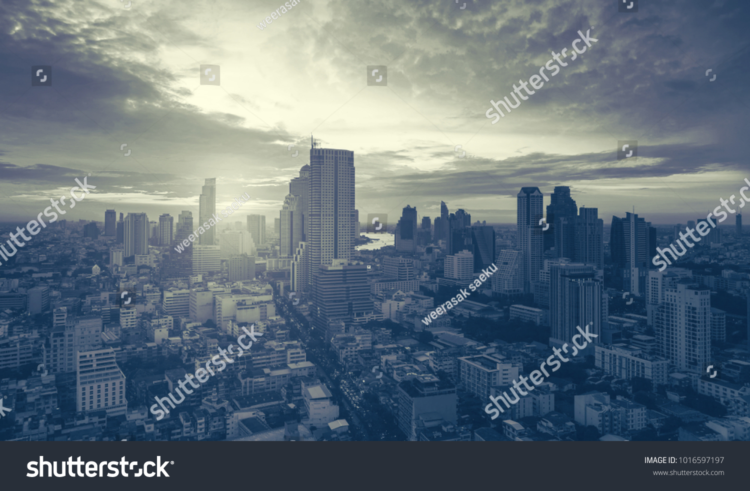 Aerial view of Bangkok modern office buildings, condominium in Bangkok city downtown with sunset sky , Bangkok , Thailand #1016597197