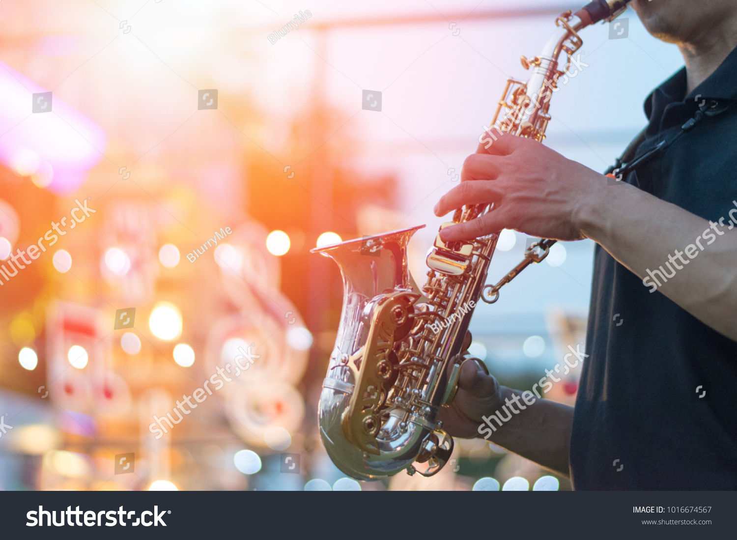 jazz festival. Saxophone, music instrument played by saxophonist player musician in fest. #1016674567