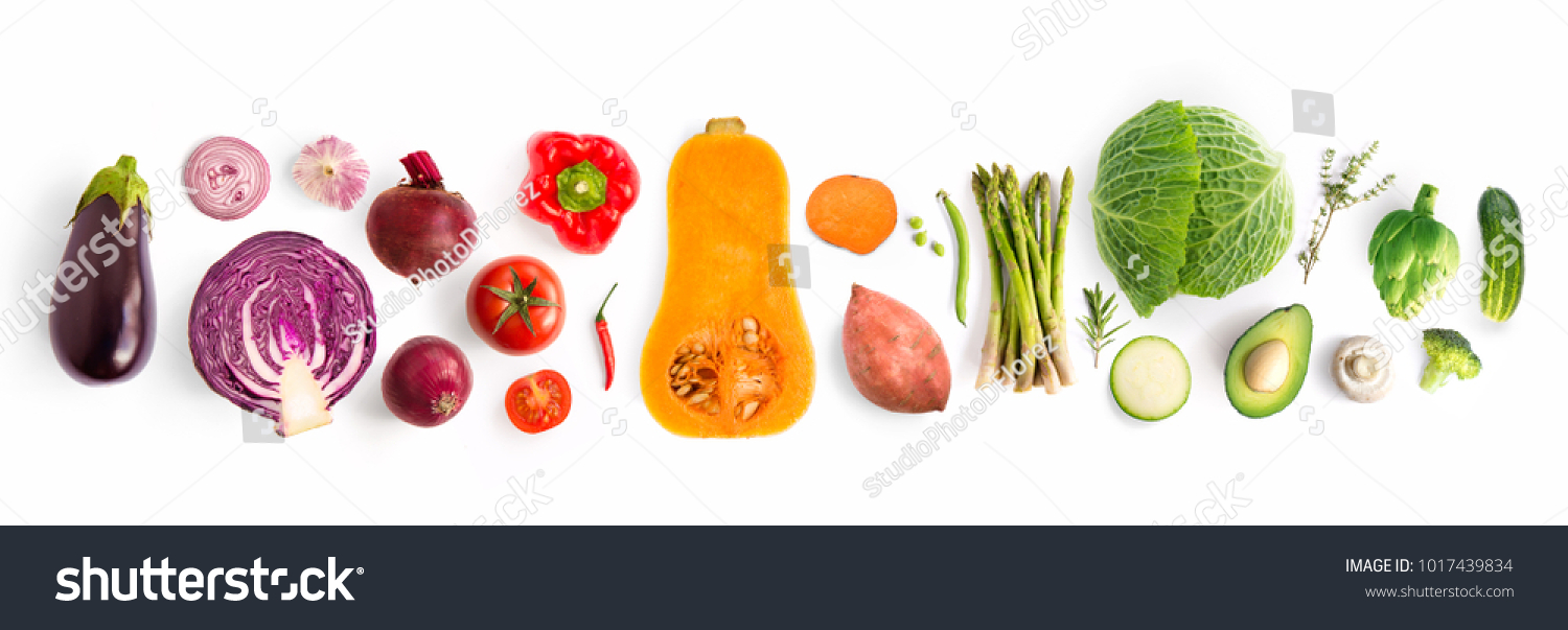 Creative layout made of green peas, cabbage, sweet potato, avocado, tomato, onion, beetroot, pepper, aubergine, artichoke, broccoli and cucumber on the white background.. Flat lay. Food concept.  #1017439834