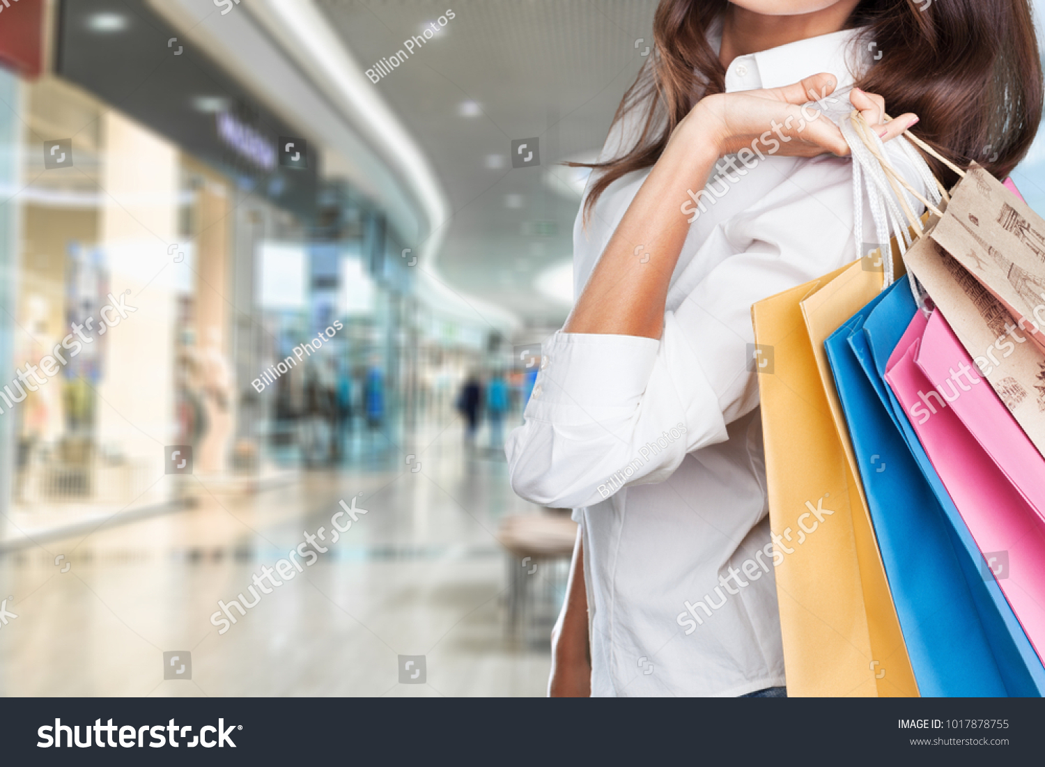 Woman holding shoping bag #1017878755