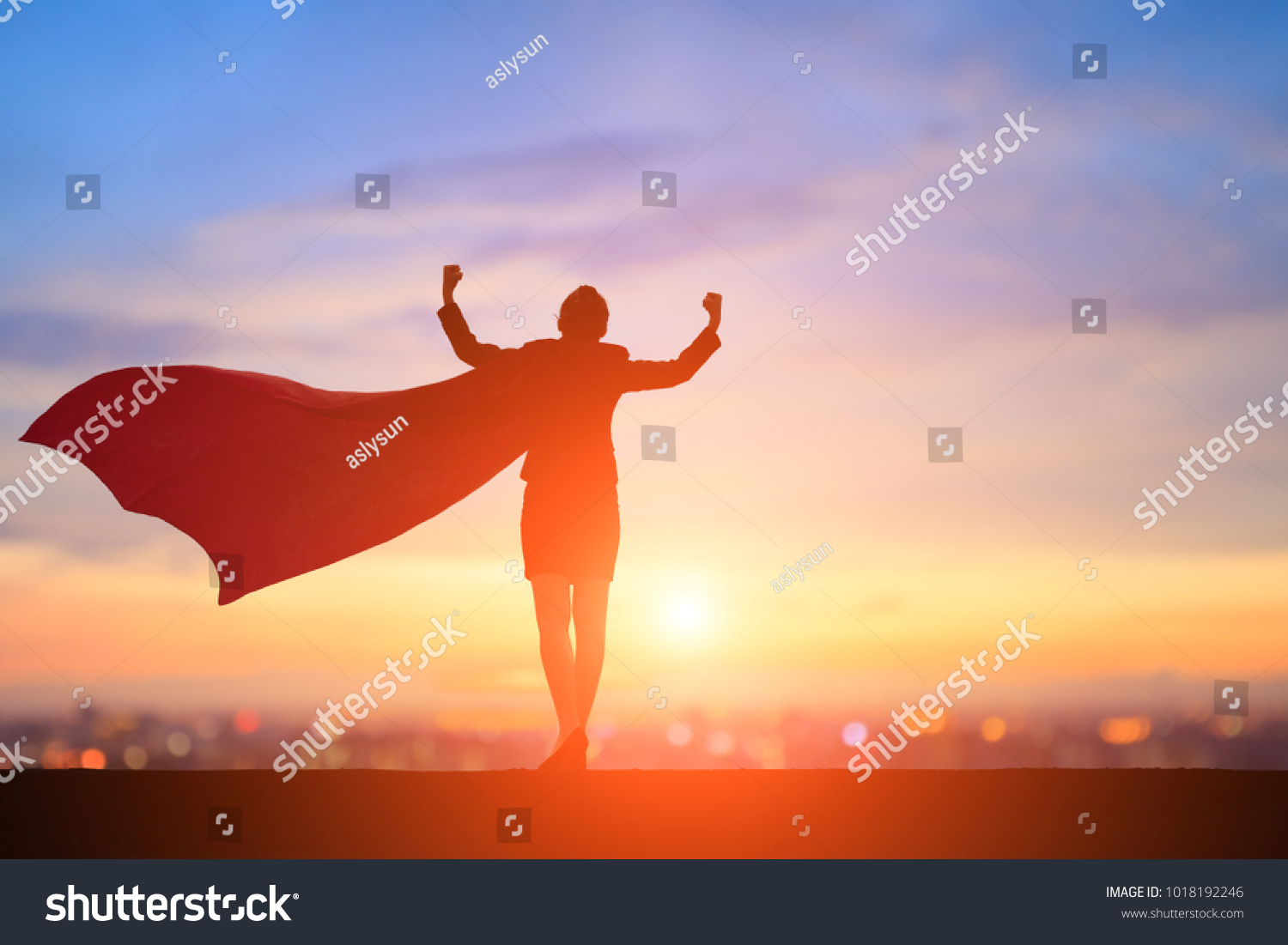 silhouette of super business woman feel strong with sunset #1018192246