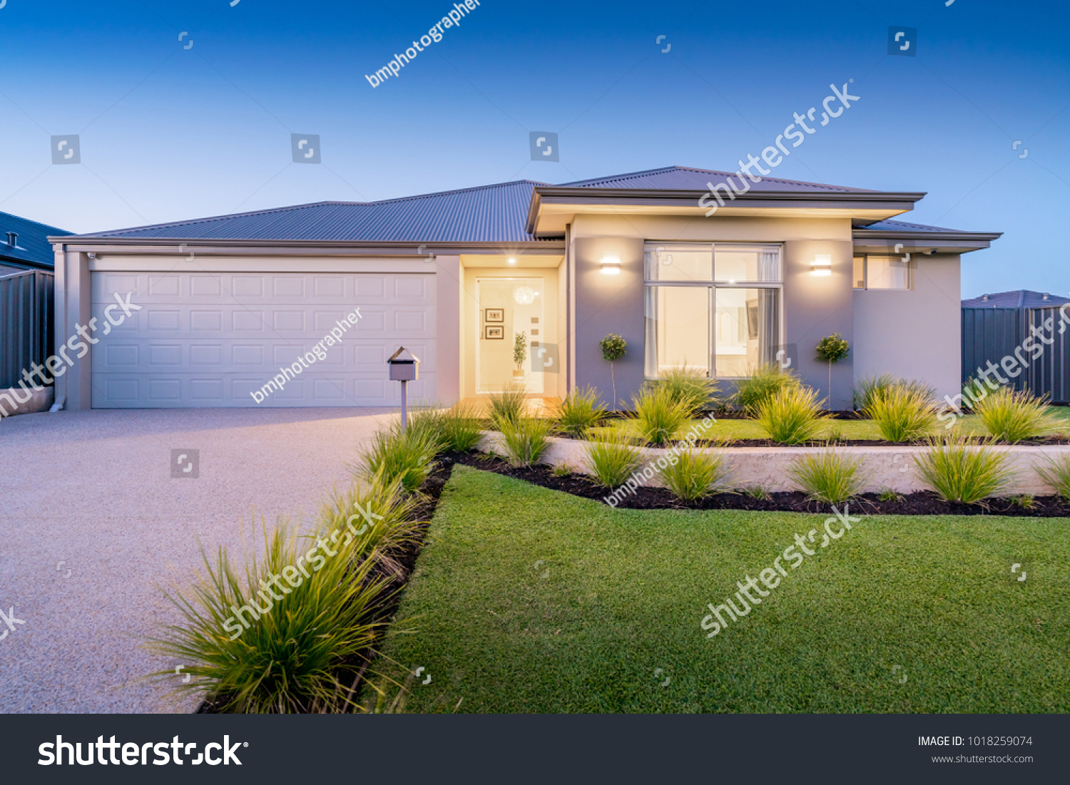 Front elevation / facade of a new modern Australian style home. #1018259074