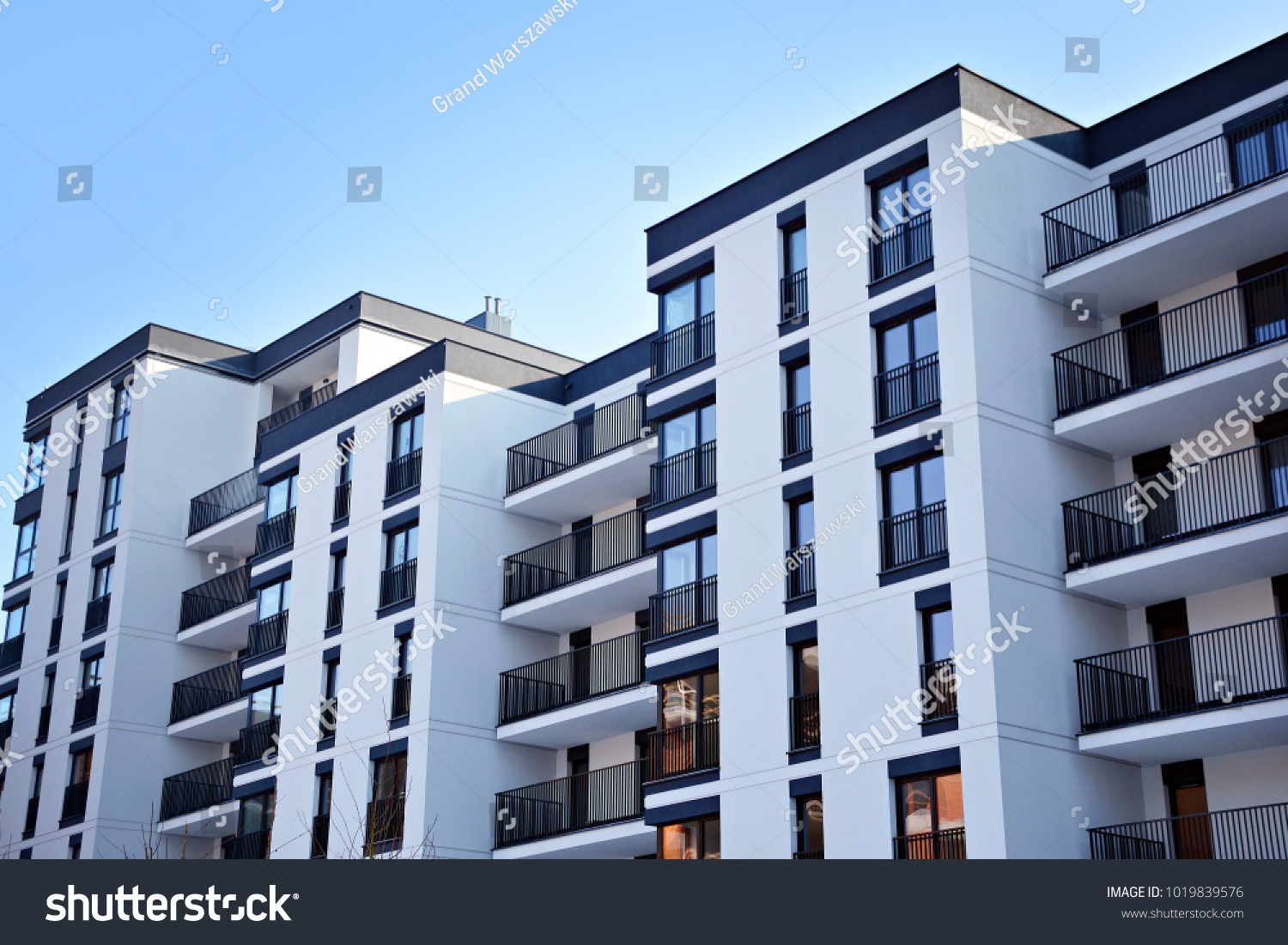 Facade of a modern apartment building #1019839576