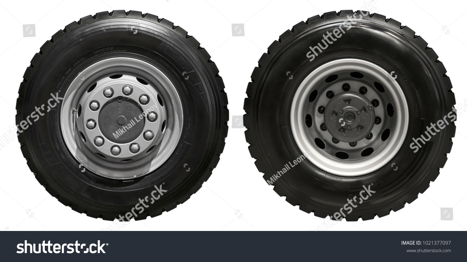 Isolated on white new front rear truck wheels on hub with black shine tires. New clean commercial transport truck mud all terrain wheels for front rear axles. High resolution commercial truck wheels #1021377097