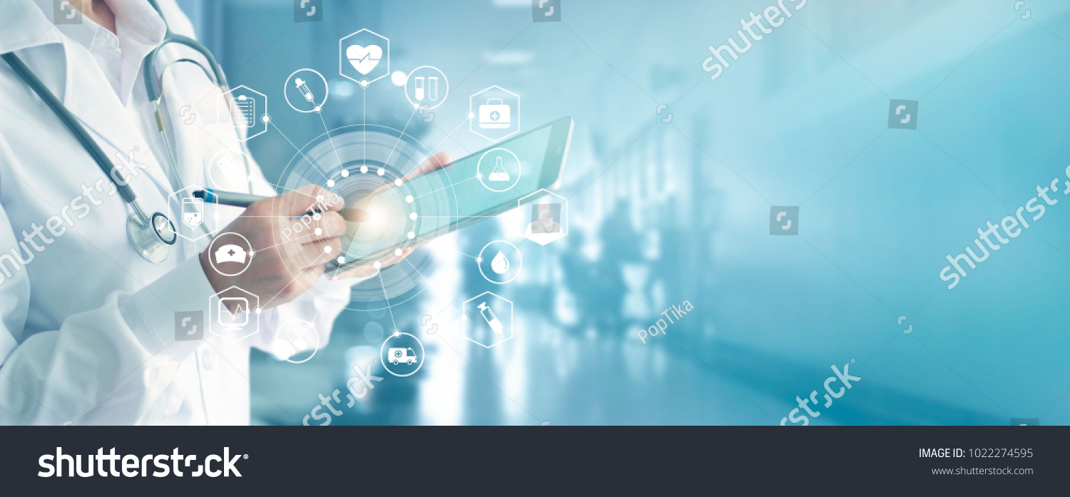 Medicine doctor and stethoscope touching icon medical network connection with modern interface on digital tablet in hospital background. Medical technology network concept #1022274595