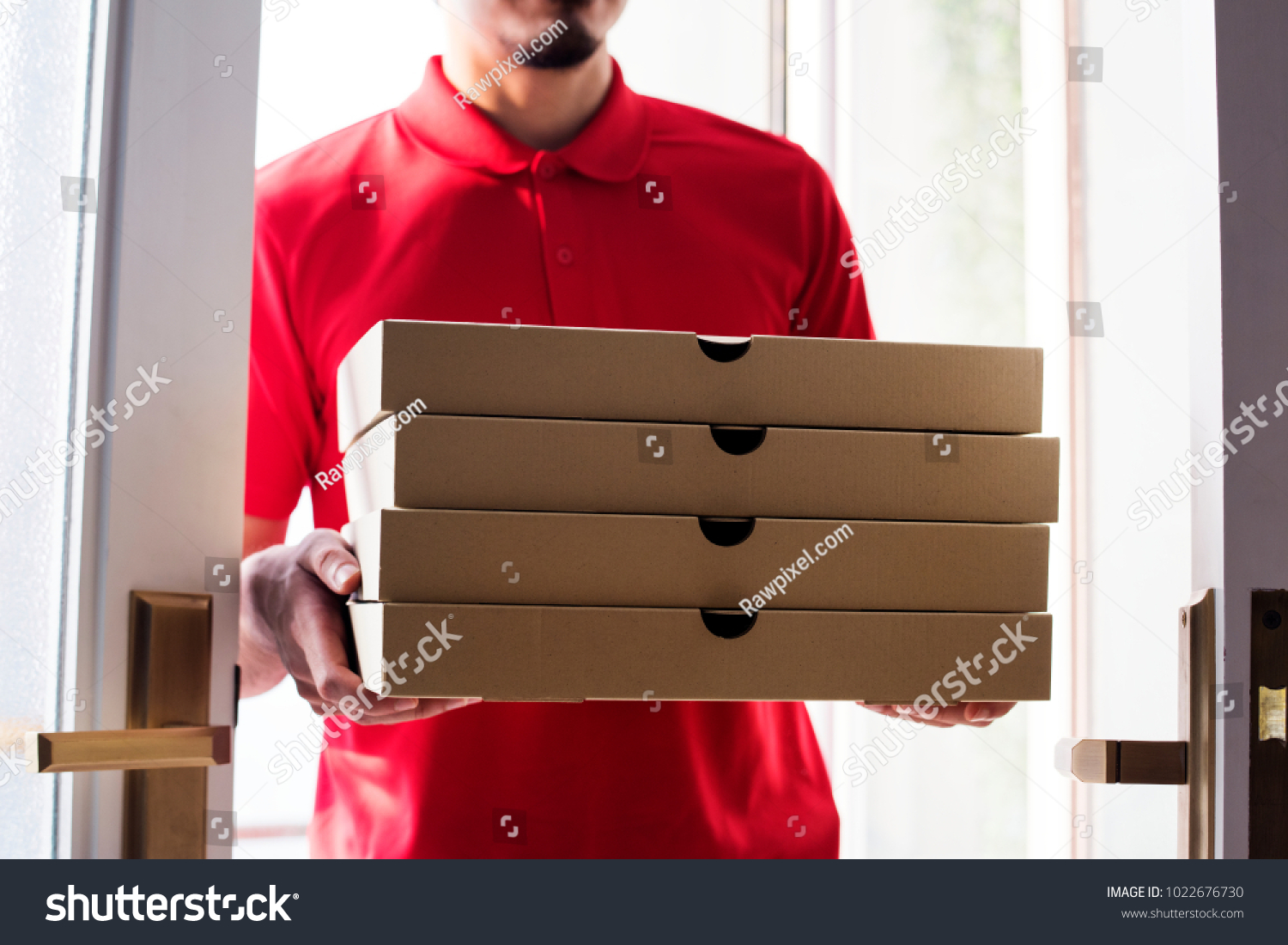 Man delivery pizza to customer #1022676730