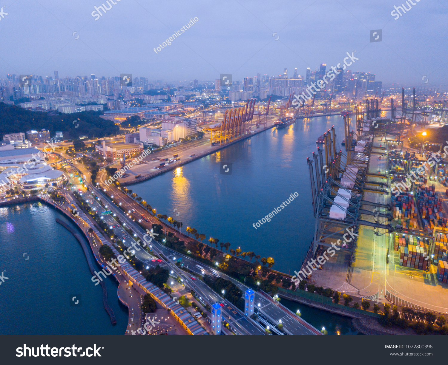 aerial shot of port of singapore at night. transportation and logistic concept #1022800396
