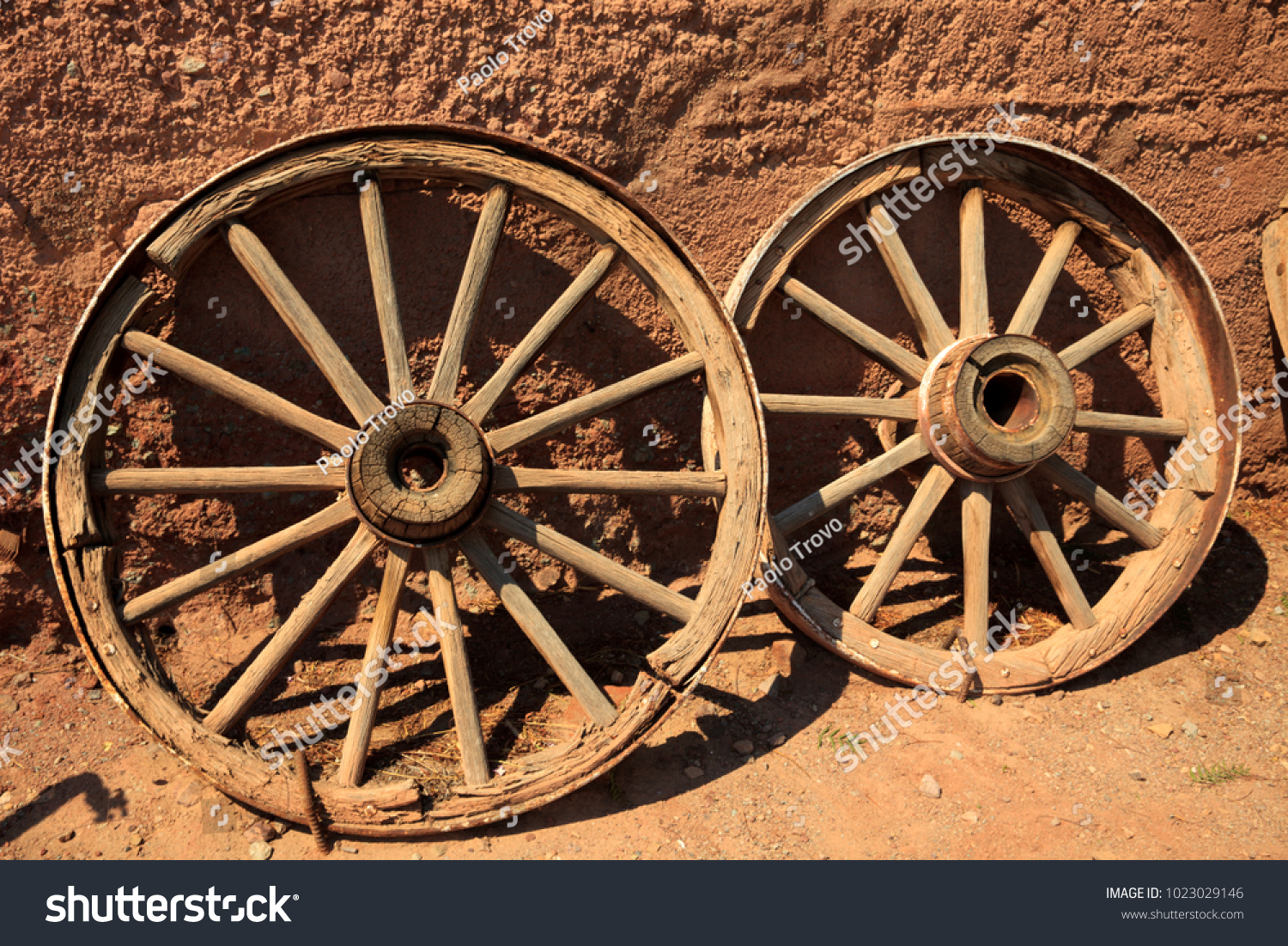 Calico, California / USA - August 23, 2015: An old wooden wheel in Calico Ghost Town, Calico, California, USA #1023029146