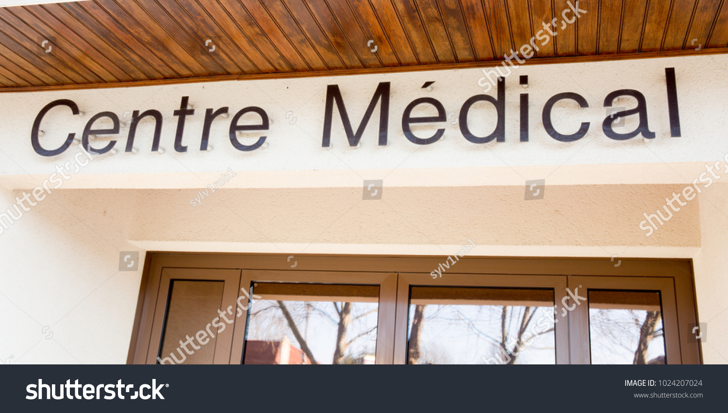 Centre Medical write in wall means Medical Center Sign in France #1024207024