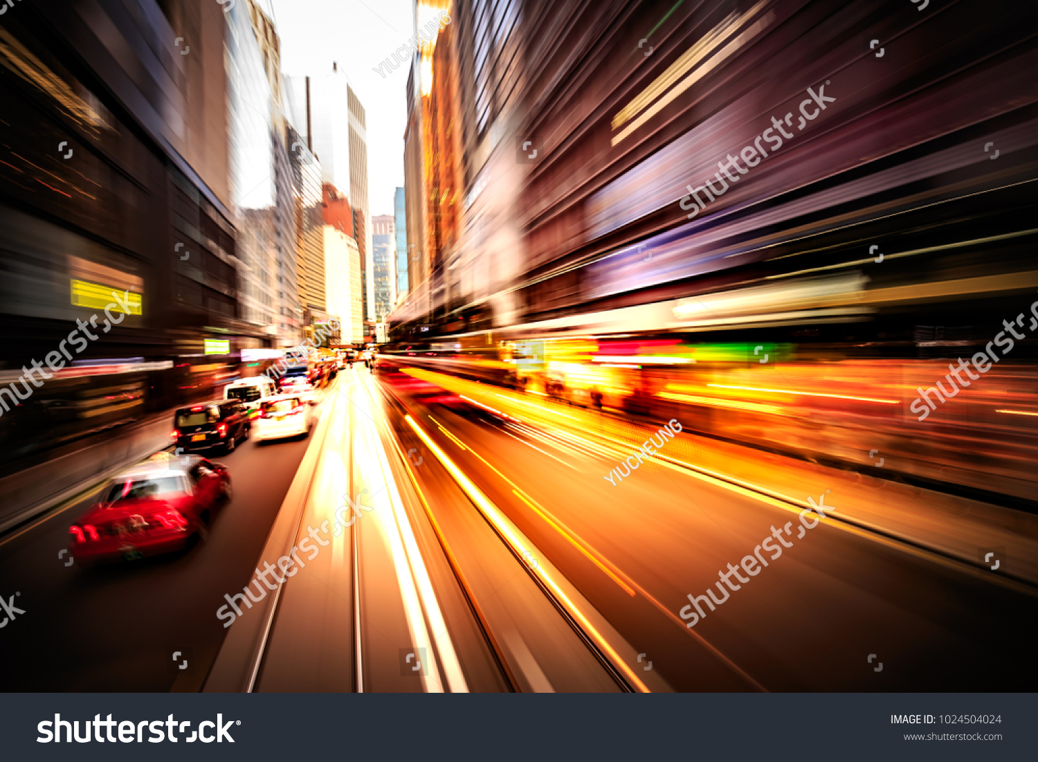 Abstract motion blur image of Hong Kong city street FOV from moving tram #1024504024