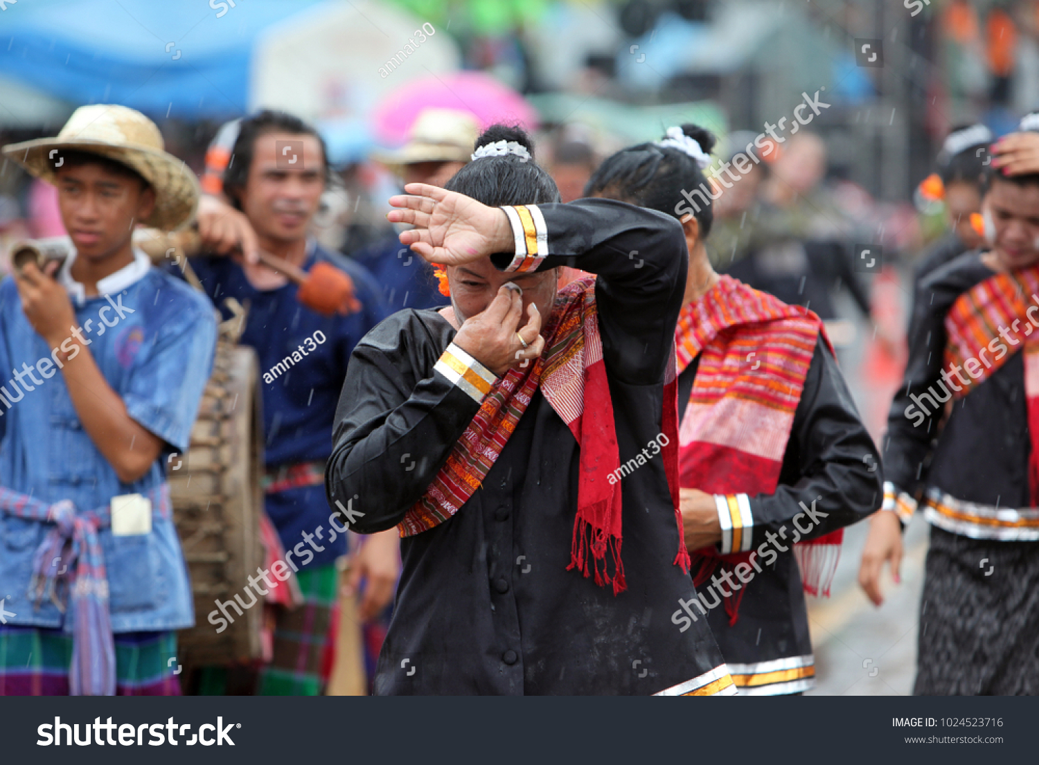 people at the rocket festival or Bun Bang Fai in Yasothon in Isan in north east Thailand.    Thailand, Yasothon, May, 2012 #1024523716