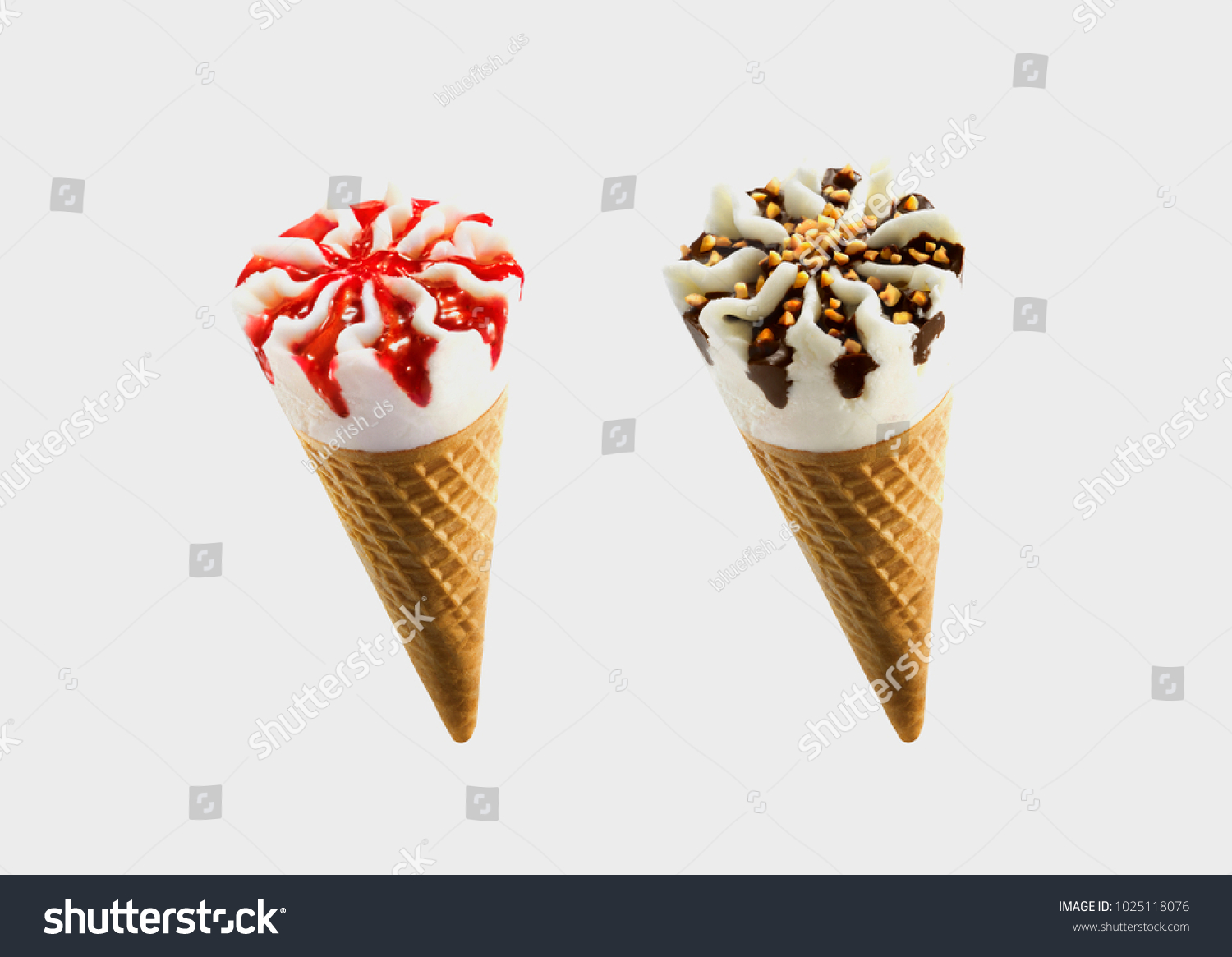 Chocolate and strawberry sorts of Ice Cream in a waffles isolated on grey background  #1025118076