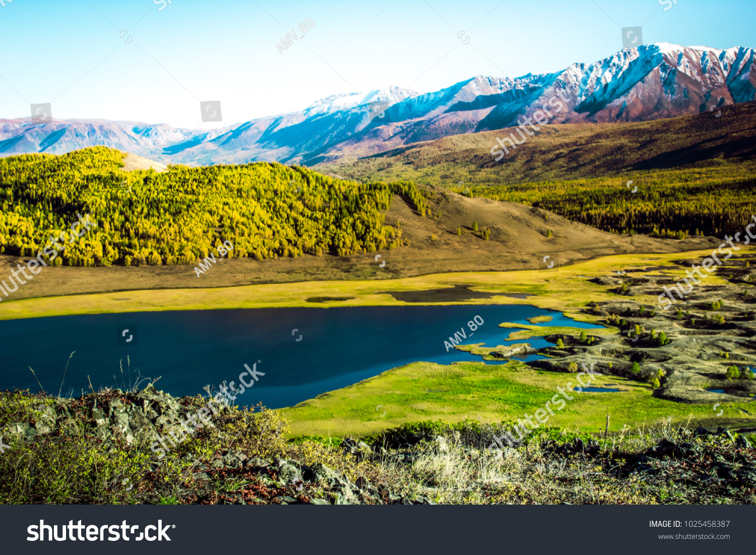 View of the Sunny mountain valley with lakes and rivers. Journey through the Altai Republic. #1025458387