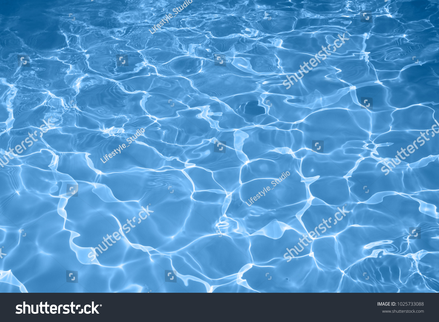 Surface of blue swimming pool, Water nature background for design #1025733088