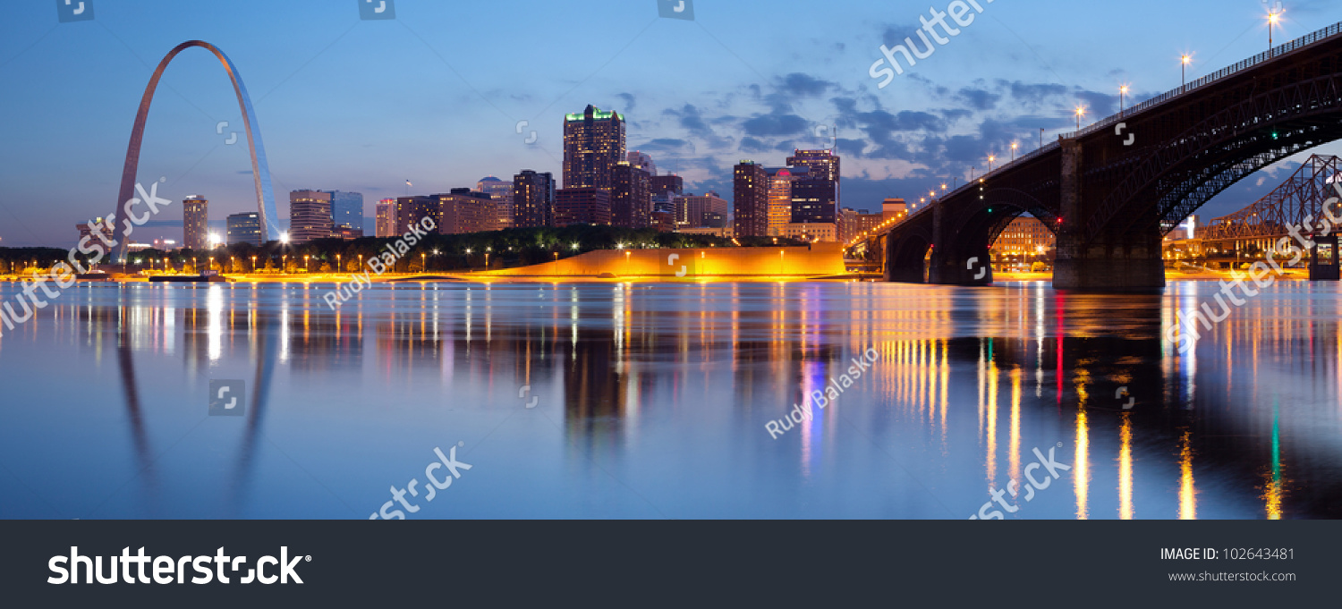 City of St. Louis skyline. Panoramic image of St. Louis downtown with Gateway Arch at twilight. #102643481
