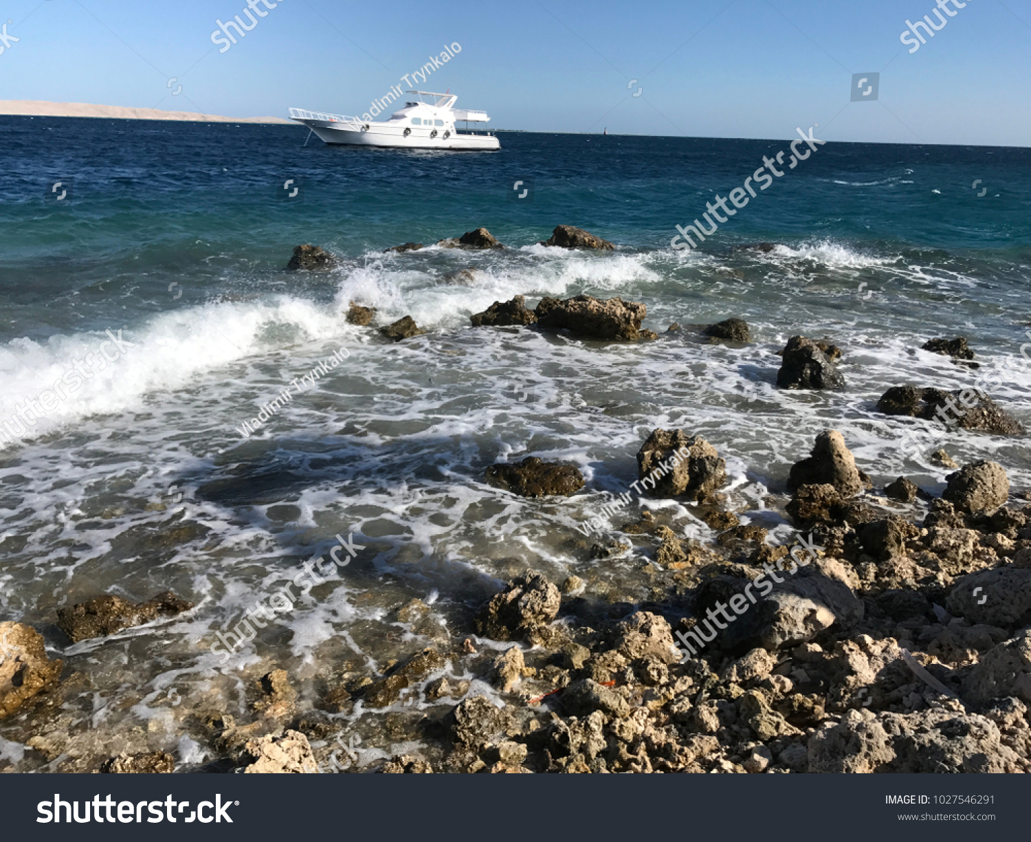red sea, on the beach sand summer vacation, stony beach, Egypt #1027546291