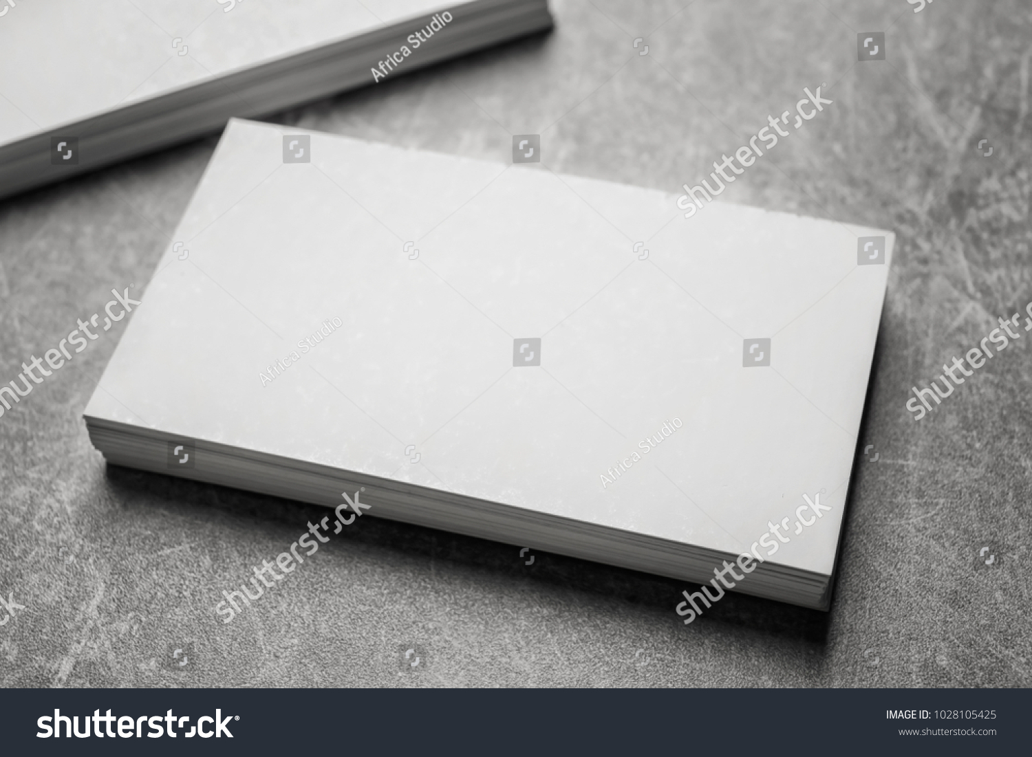 Blank business cards on grey background #1028105425