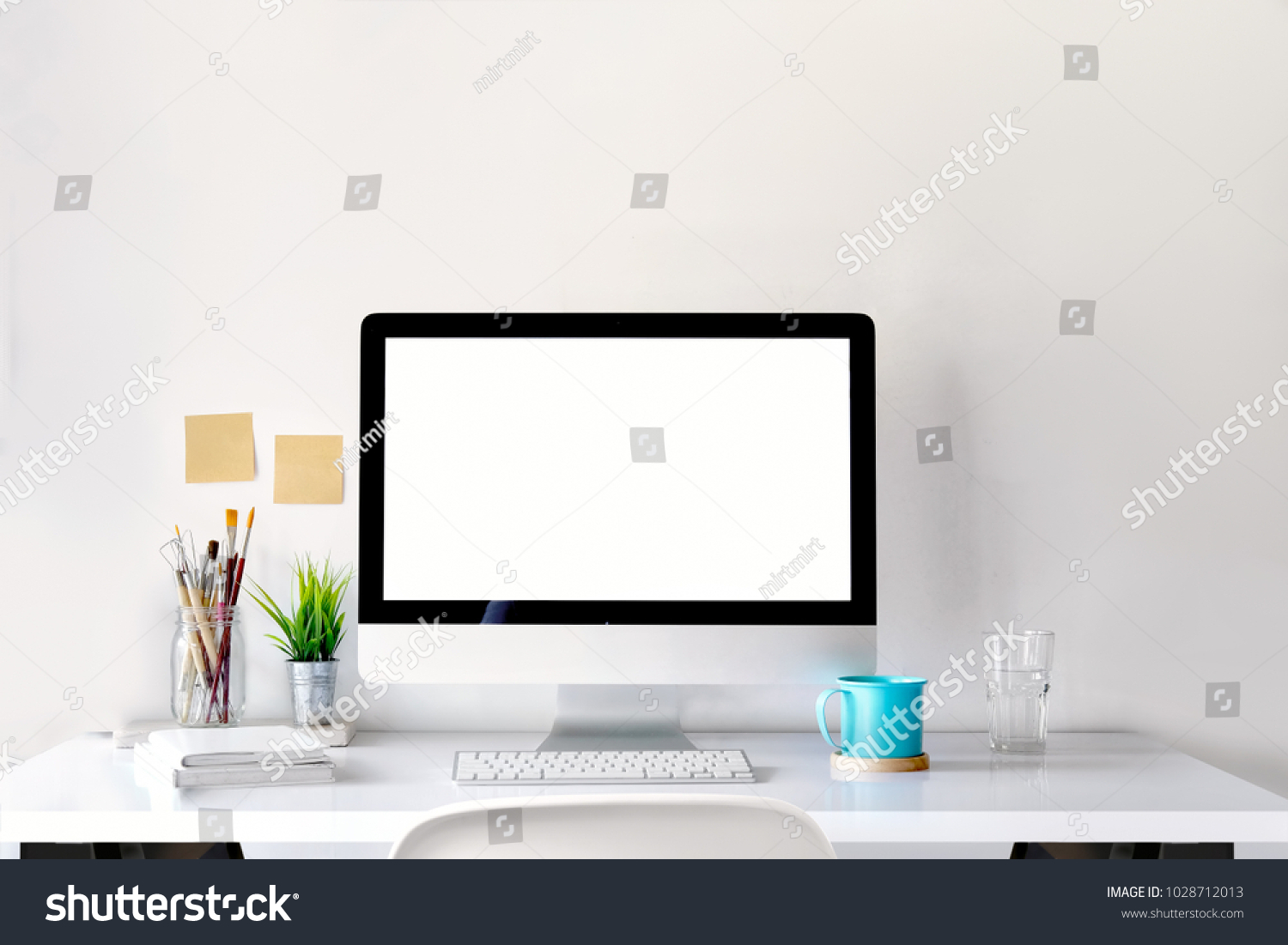 
Mockup of creative desktop of designer with coffee mug. #1028712013