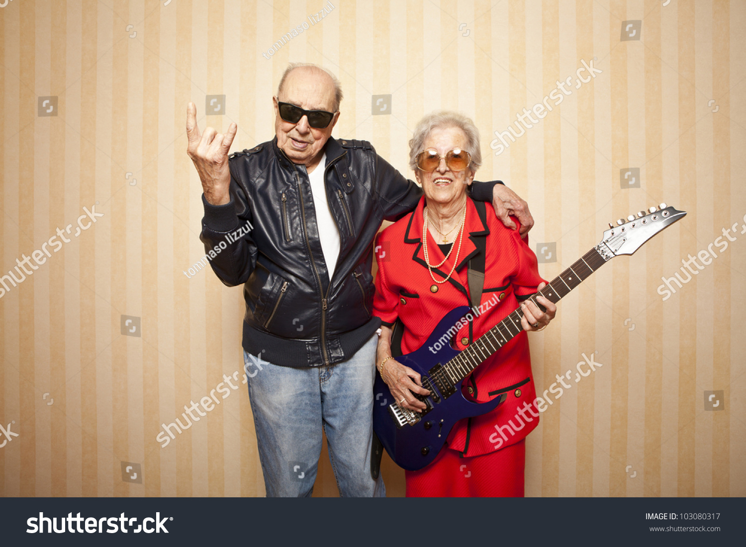 cool fashion elder couple with electric guitar #103080317