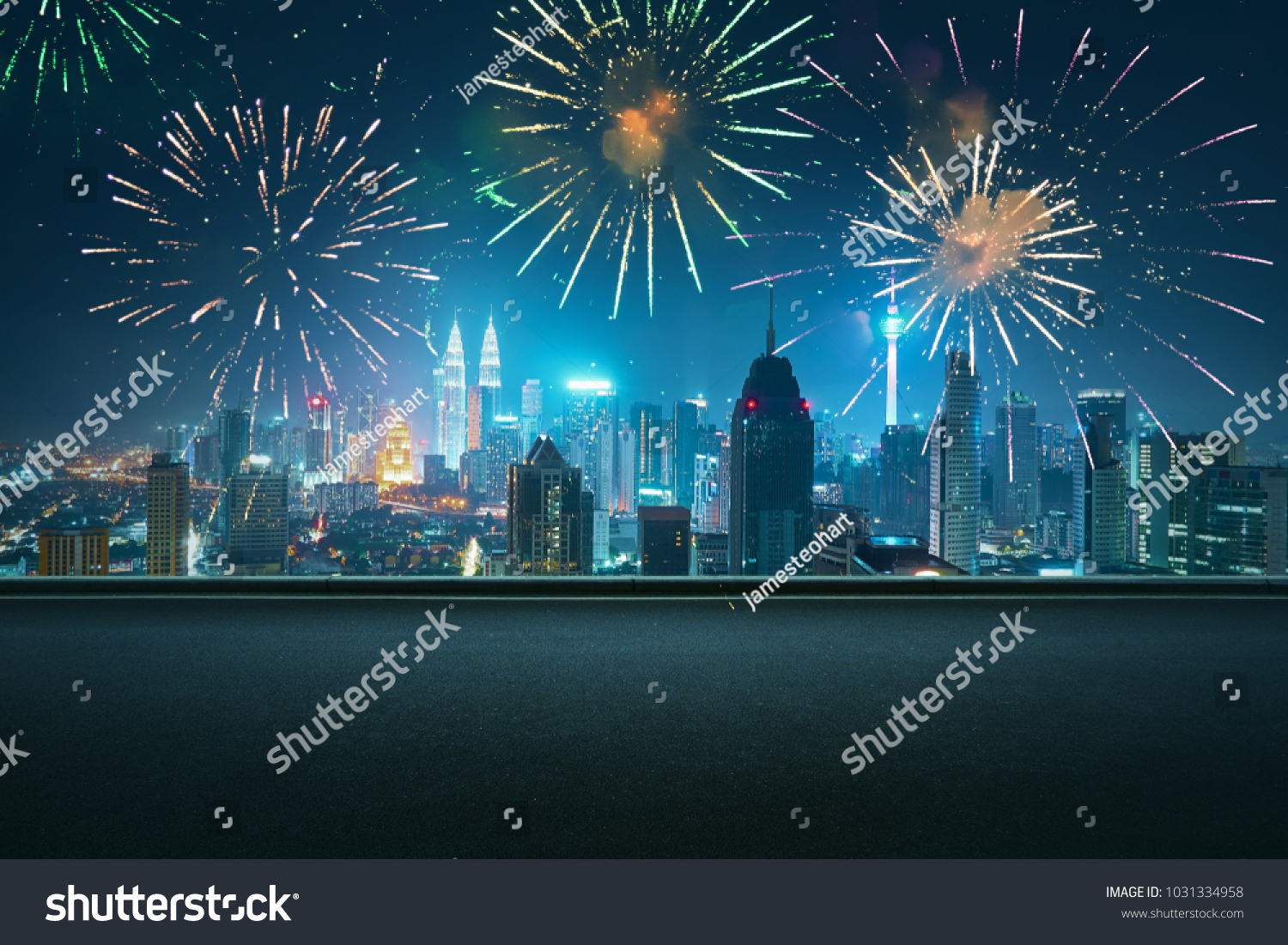 Asphalt empty road side with city skyline and firework sky background . Night scene with firework celebration . #1031334958