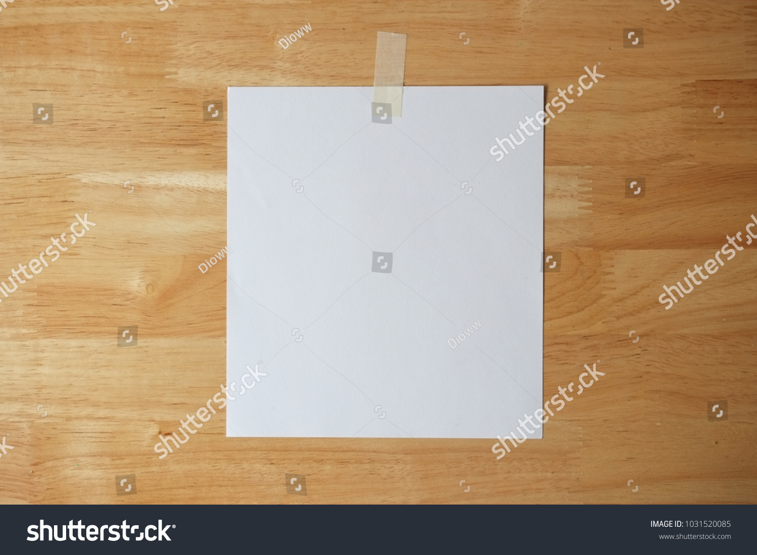 paper note on wooden background #1031520085