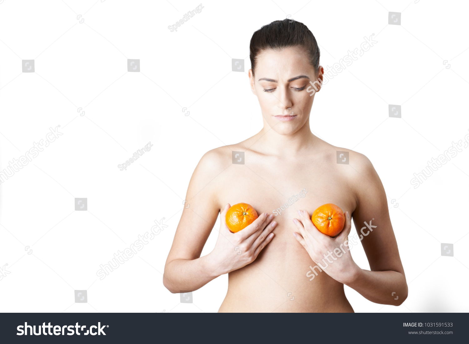 Conceptual Image To Illustrate Breast Enlargement Surgery #1031591533