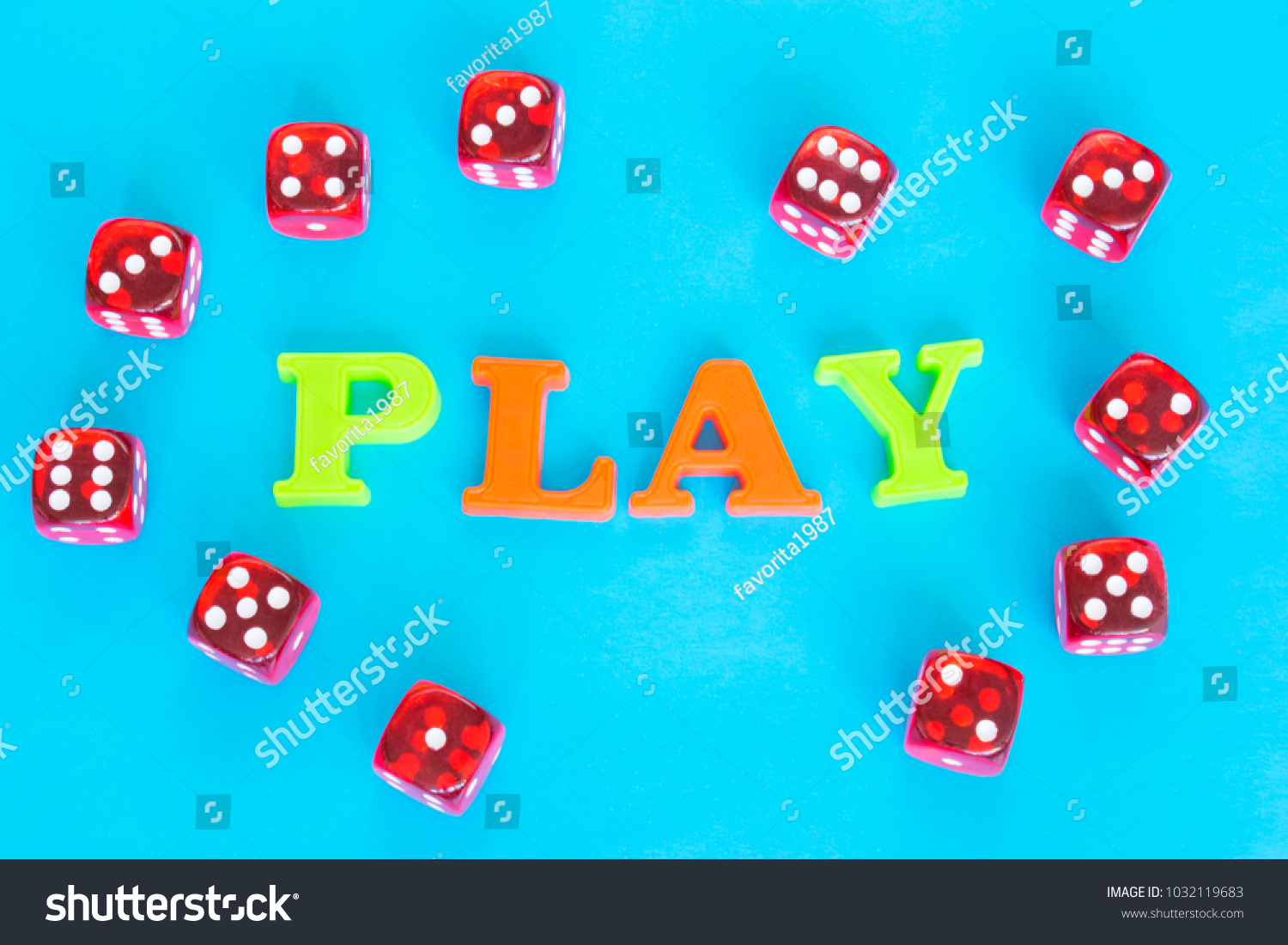 Word Play made of colorful letters and red dice on the blue background.  #1032119683