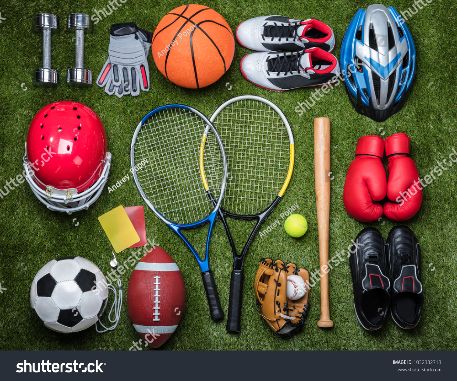 High Angle View Of Various Sport Equipments On Green Grass #1032332713