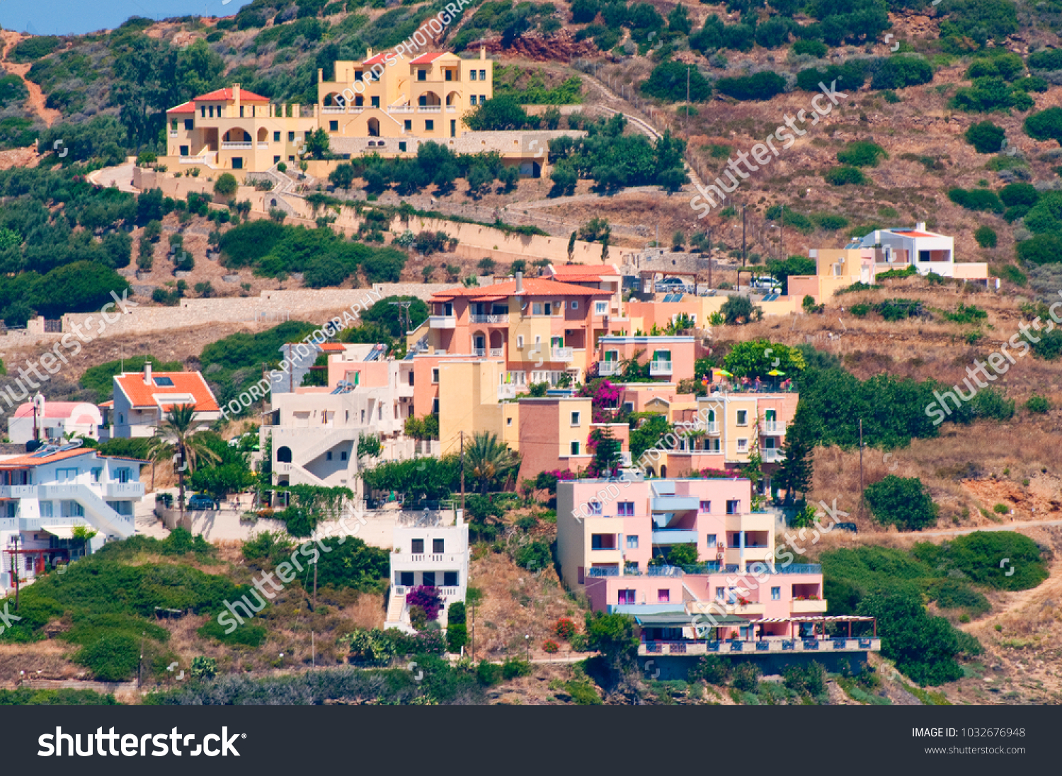 villas on the mountainside on coast #1032676948