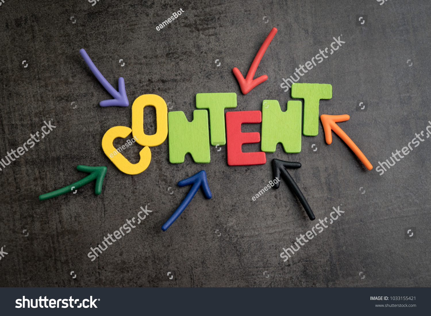Colorful arrows pointing to the word CONTENT at the center on black cement wall, content is king in advertising and communication concept,  creativity of using content on website and social media. #1033155421