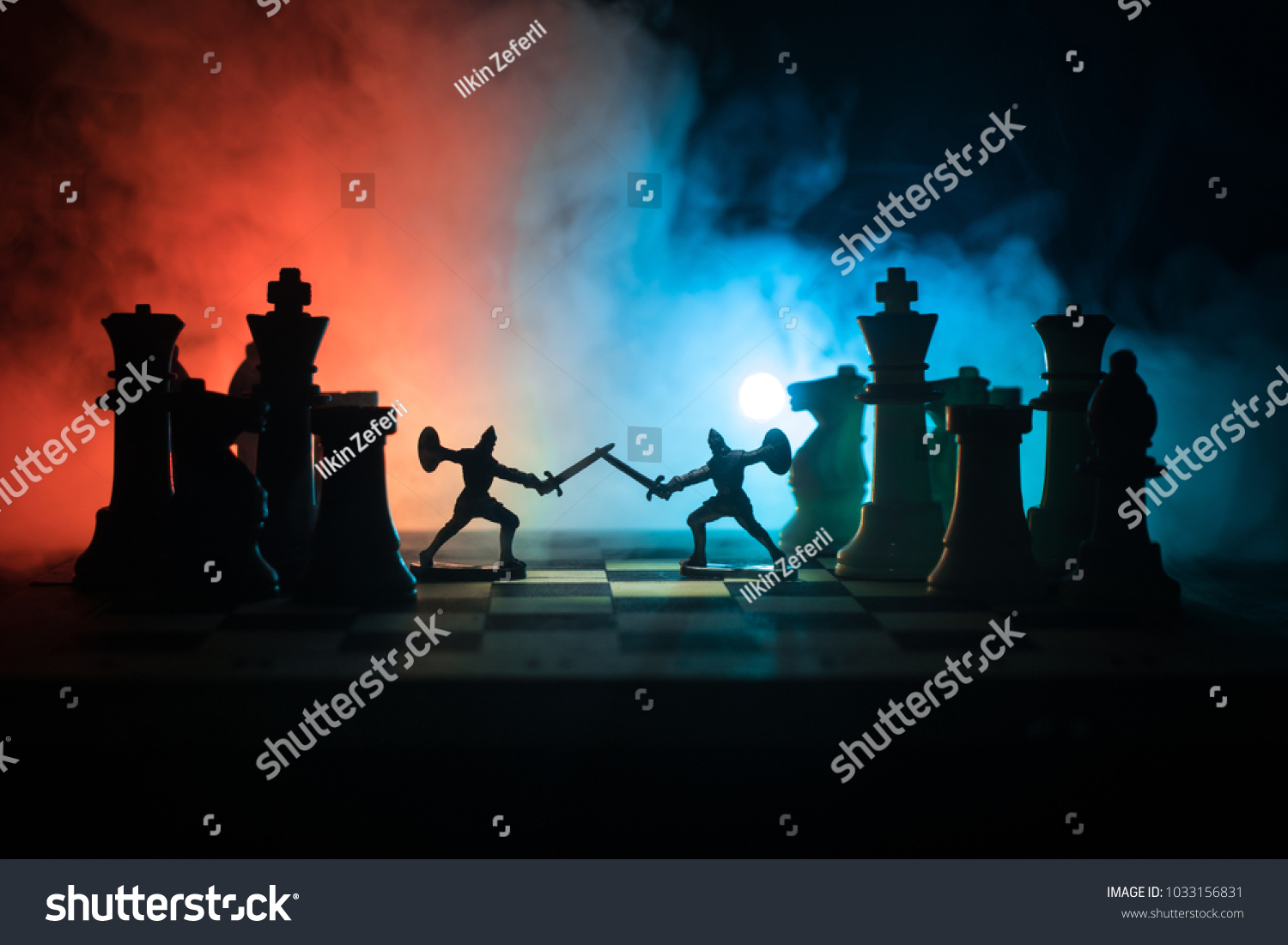 Medieval battle scene with cavalry and infantry on chessboard. Chess board game concept of business ideas and competition and strategy ideas Chess figures on a dark background with smoke and fog. #1033156831