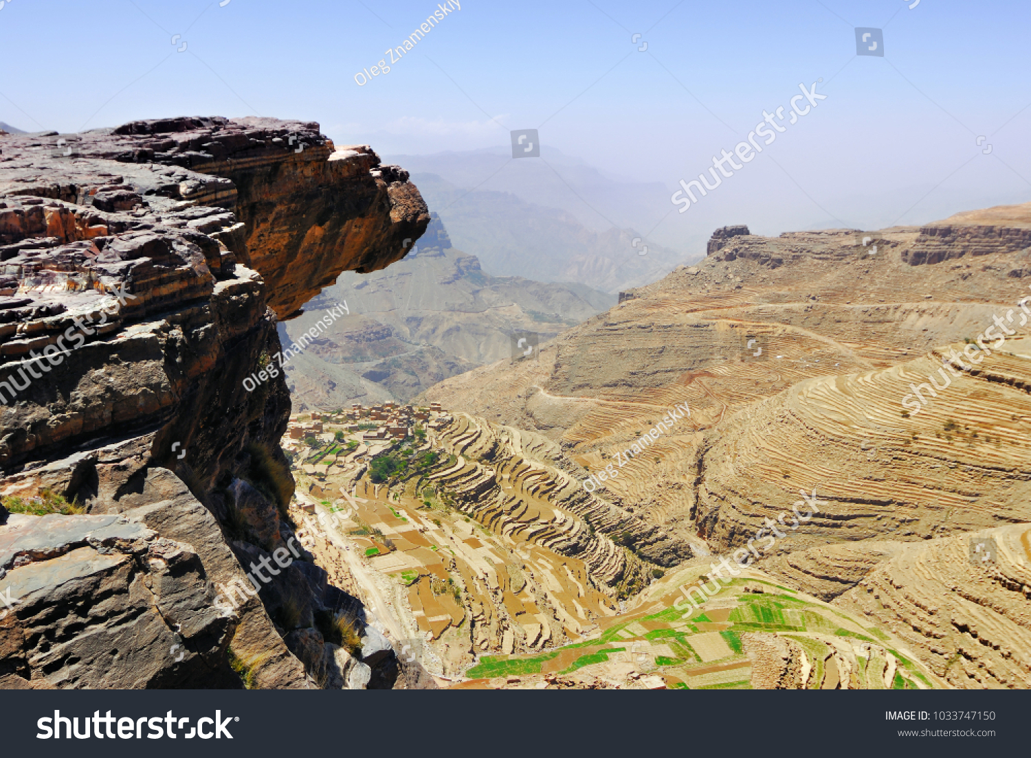 An edge of the cliff hungs over abyss 800 meter deep.  Plateau Bokur, Yemen #1033747150