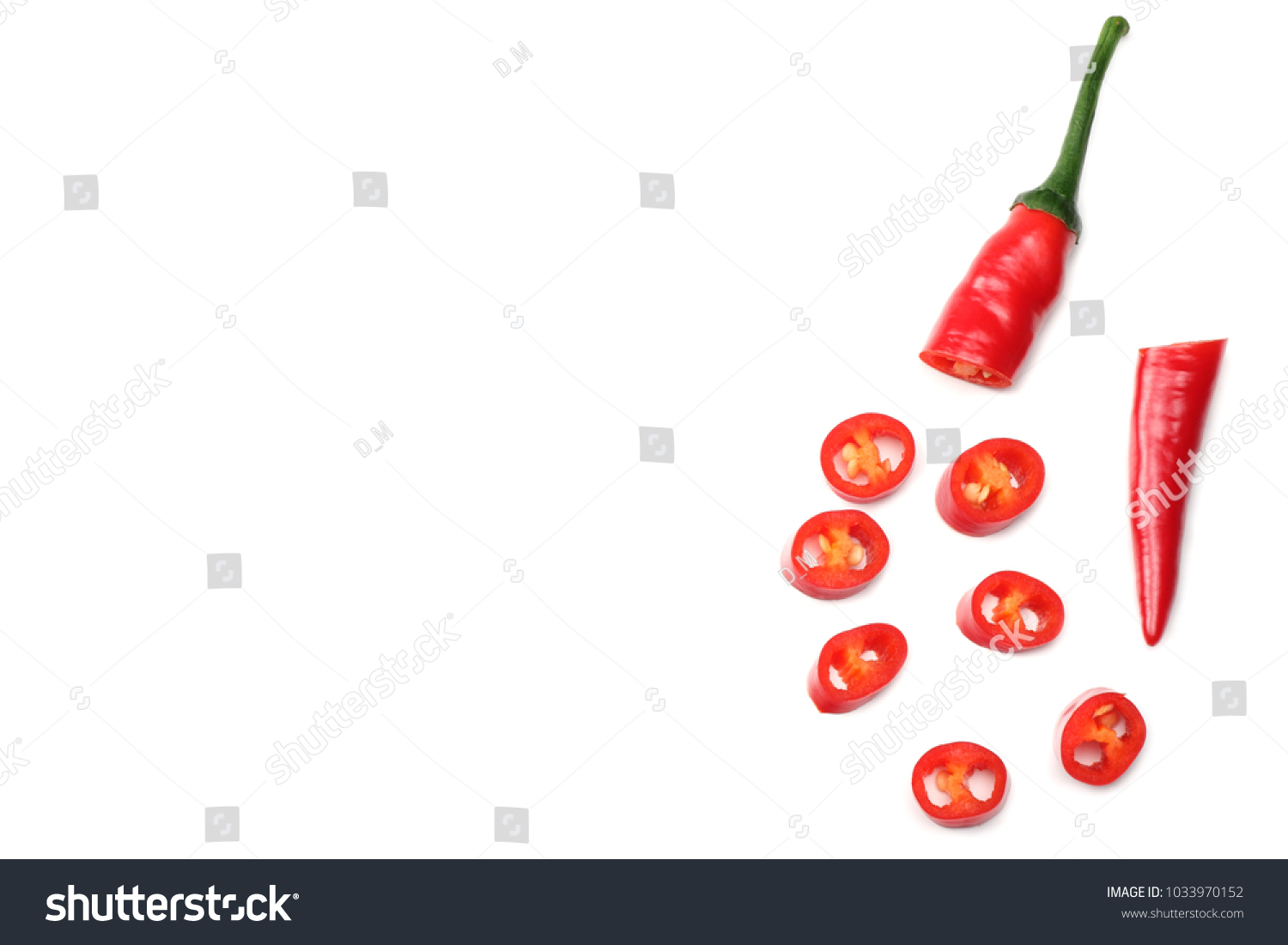 sliced red hot chili peppers isolated on white background top view #1033970152